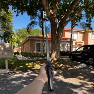 new unused foldable tripod with bluetooth microphone